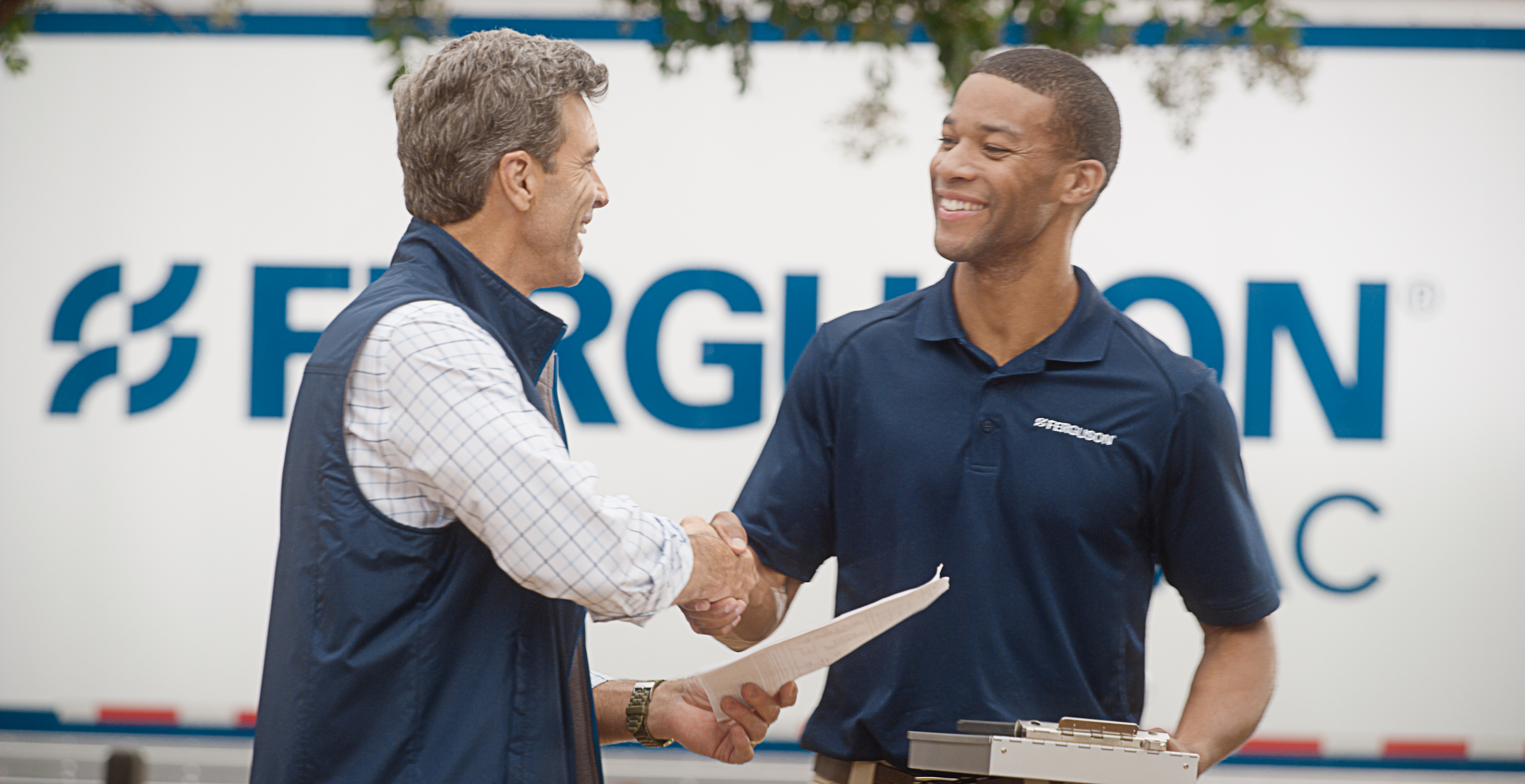 Image of Ferguson associate shaking hands with a customer'